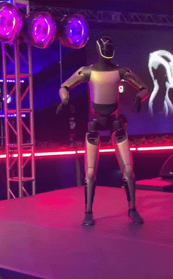 特斯拉股东批准马斯克万亿美元薪酬包 世界首富与机器人共舞庆祝 